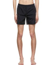 off white swim trunks