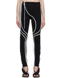 OTTOLINGER - Black Strappy leggings - Lyst