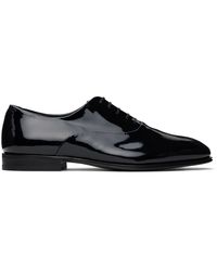 Ferragamo - Chaussures oxford noires à laçage entrecroisé à l'intérieur - Lyst