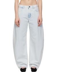Alaïa - Low Waist Round Jeans - Lyst