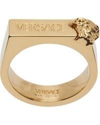 Versace - Bague dorée à logo gravé - Lyst