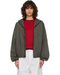 The North Face - Khaki Tnf Box Packable Hooded Wind Jacket - Lyst