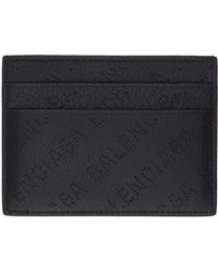 Balenciaga - Porte-cartes noir à motif à logo perforé - Lyst
