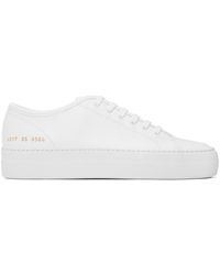 Common Projects - Baskets basses tournament super blanches - Lyst