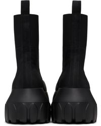 靴 Hollywood Flared Mega Tractor Rick Owens Mega Tractor Boots - Black | Editorialist