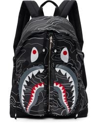 A BATHING APE® camouflage-print mesh-compartment Backpack - Farfetch