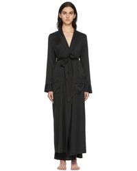 Femme Vêtements Vêtements de nuit Robes de chambre et peignoirs Peig en maille cozy Synthétique Skims en coloris Noir 