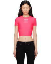Versace - T-shirt rose à logo et texte imprimés - Lyst