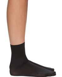 Wolford Chaussettes noires Velvet 66