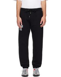 Off-White c/o Virgil Abloh - Motion Arrow Cuffed Sweatpants - Lyst