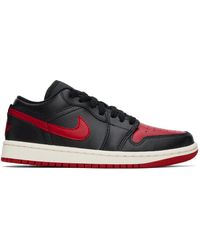 Nike - Baskets basses air jordan 1 noir et rouge - Lyst