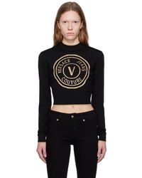 Versace - Pull noir à logo circulaire - Lyst