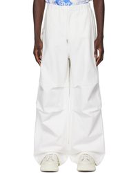 Jil Sander - Pantalon cargo blanc à logo gaufré - Lyst