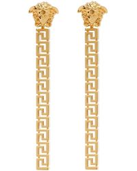 Versace - Boucles d'oreilles pendantes dorées à méduse et à motif à clé grecque - Lyst