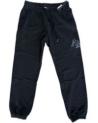 Amiri - Staggered Logo Sweatpants Aw23Mjp005 001" - Lyst