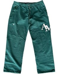 Amiri - Staggered Logo Sweatpants Ps24Mjl017 428" - Lyst