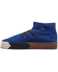 reebok black leather mid blue trainers