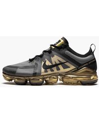 vapormaxes black and gold