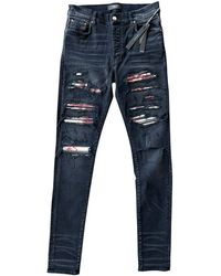 Amiri - Tie-Dye Patch Thrasher Jeans "Aged" Ss22Mds006 023 Aged" - Lyst