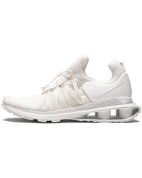 nike shox gravity cyan