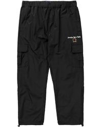 AWAKE NY - X Tommy Hilfiger Crest Track Pants Dm0Dm17386 Blk" - Lyst