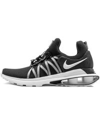 nike shox gravity cyan