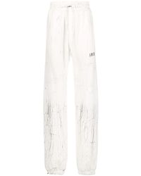 Amiri - Cracked Dye Logo Sweatpants Ps23Mjl026 100" - Lyst