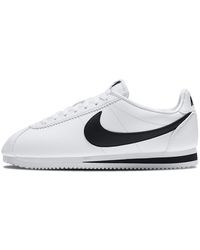 white and black cortez shoes