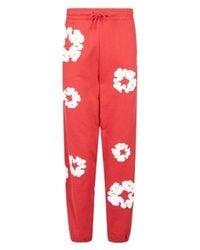 DENIM TEARS - Cotton Wreath Sweatpants "red" - Lyst