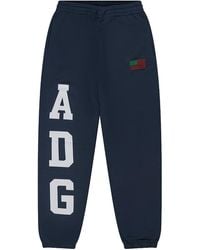 DENIM TEARS - Adg Pan African American Flag Sweatpants Dt802" - Lyst