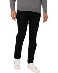 HUGO - 634 Tapered Jeans - Lyst