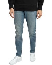 Calvin Klein - Slim Taper Jeans - Lyst