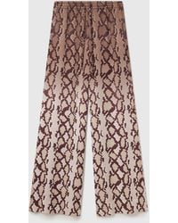 Stella McCartney - Snake Print Oversized Drawtstring Trousers - Lyst