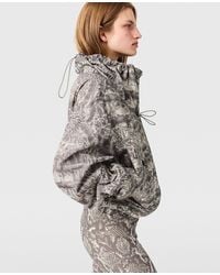 Stella McCartney - High-Neck Snake Print Hooded Jacket - Lyst