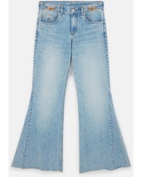 Stella McCartney - Clasp-embellished Low-rise Flared Jeans - Lyst