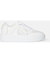 Stella McCartney - Lace-up Embossed Logo Sneakers - Lyst