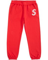 red supreme joggers