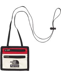 supreme north face travel wallet