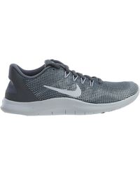 nike training flex trainers in grey with peach swoosh