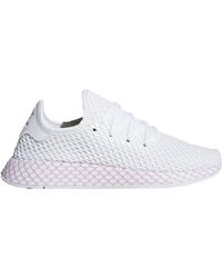 adidas deerupt dorate e bianche