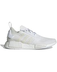 nmd r1 white black gold