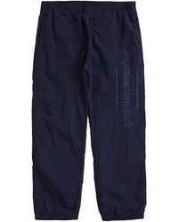 supreme side logo track pants