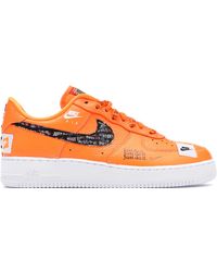 orange nike forces