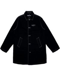 supreme orange trench coat