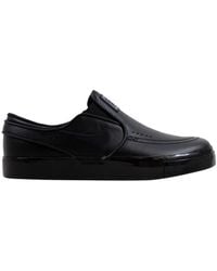 white nike loafers