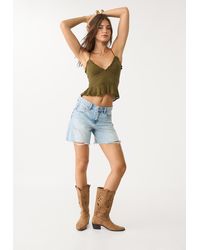 Stradivarius - Top Aderente Con Volant - Lyst