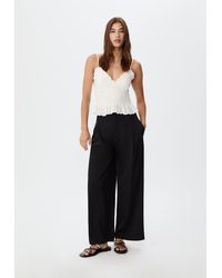Stradivarius - Top Aderente Con Volant - Lyst