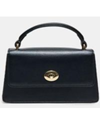 Stradivarius - Borsa A Tracolla Rigida Con Chiusura Metallica - Lyst