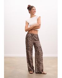 Stradivarius - Pantaloni Lunghi Fluidi Satinati - Lyst