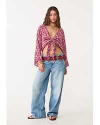 Stradivarius - Blusa Fluida Con Nodo - Lyst